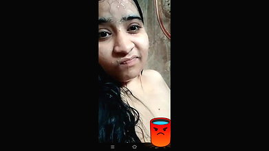 Indian girl showing boobs while bathing nude